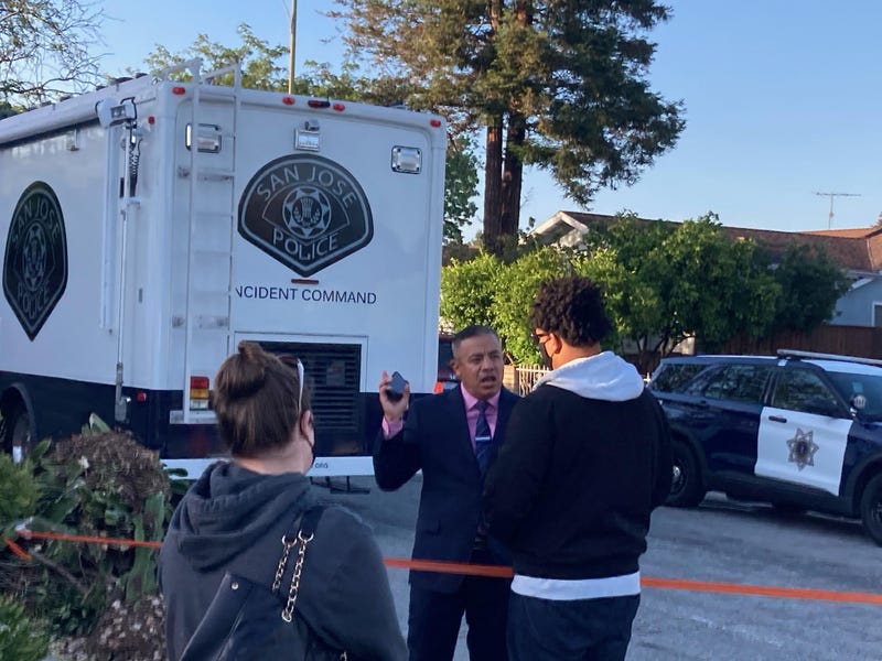 San Jose Police Sgt. Christian Camarillo talks with neighbors.