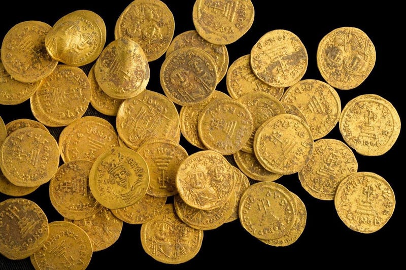 Gold coins discovered by Israeli archaeologists almost 1,400 years after they were stashed.