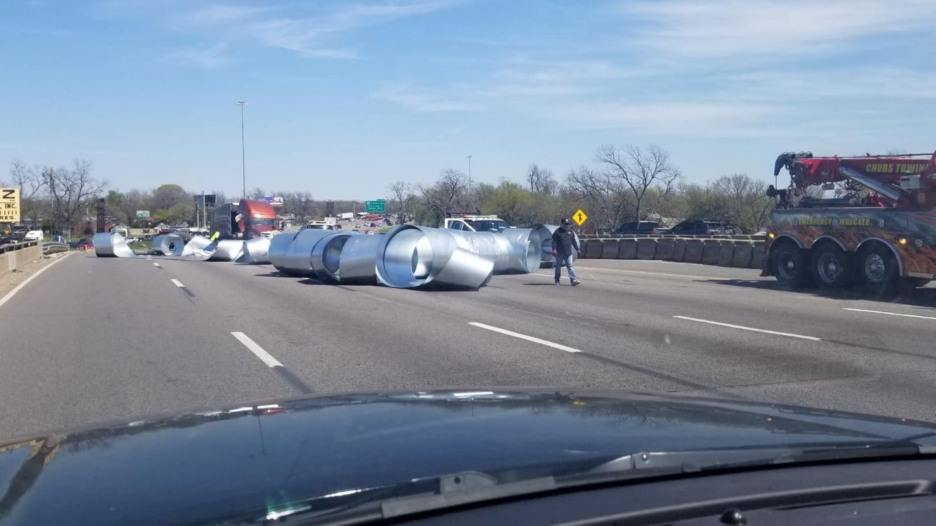 Truck loses load of sheet metal, closing down I-30 in East Dallas for hours Sunday