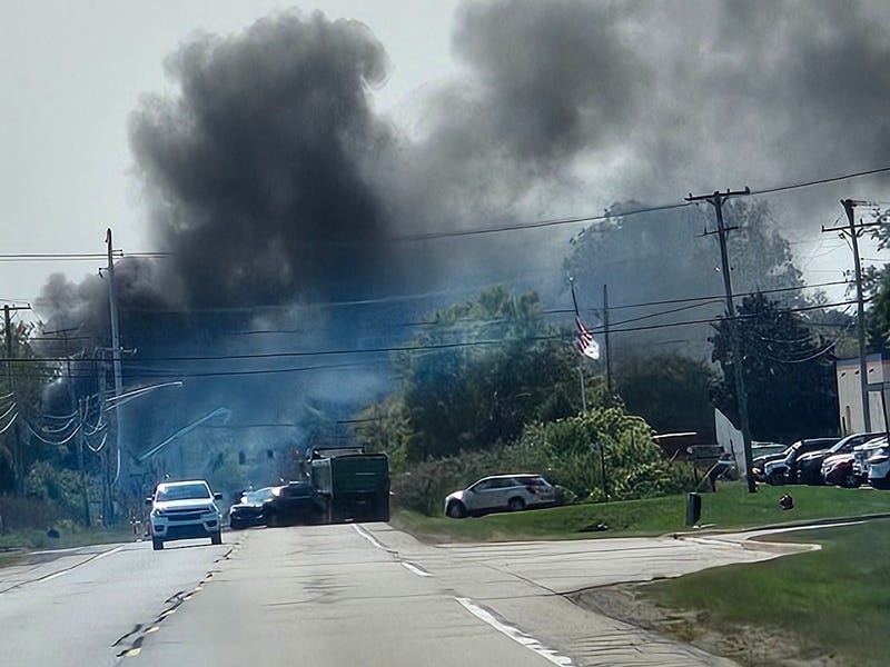 Black smoke and emergency vehicles near 32 Mile and Powell