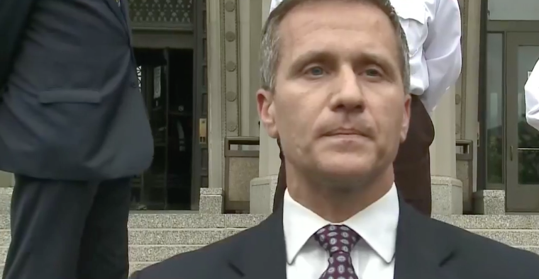 Gov. Eric Greitens speaks to media outside the St. Louis Civil Courts Building after the invasion of privacy of charge was dropped.