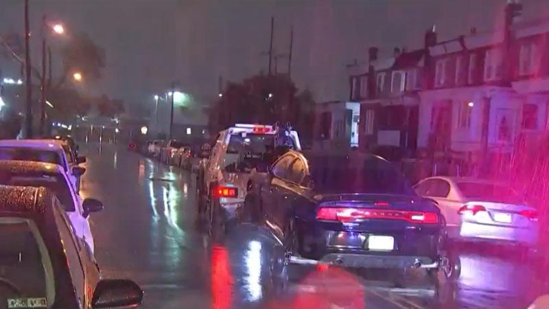 Police towed away this Dodge Charger as part of the investigation into the shooting of officers Richard Mendez and Raul Ortiz, which led to Mendez's death.
