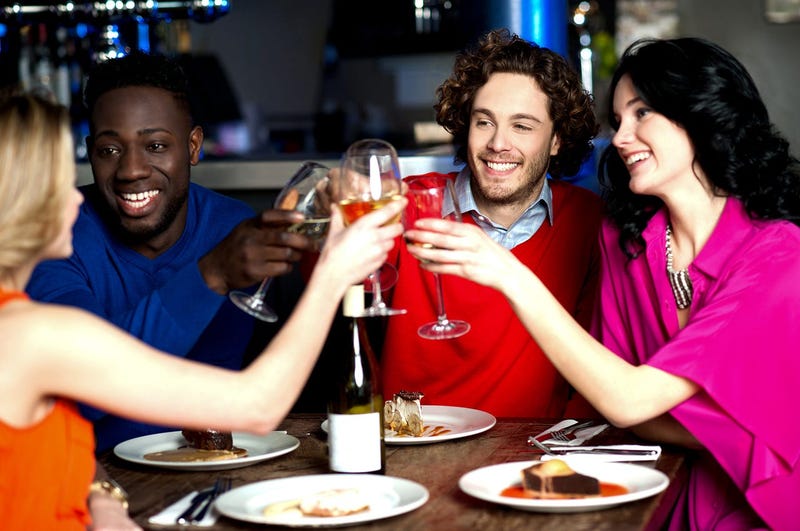 Group of friends raising a toast