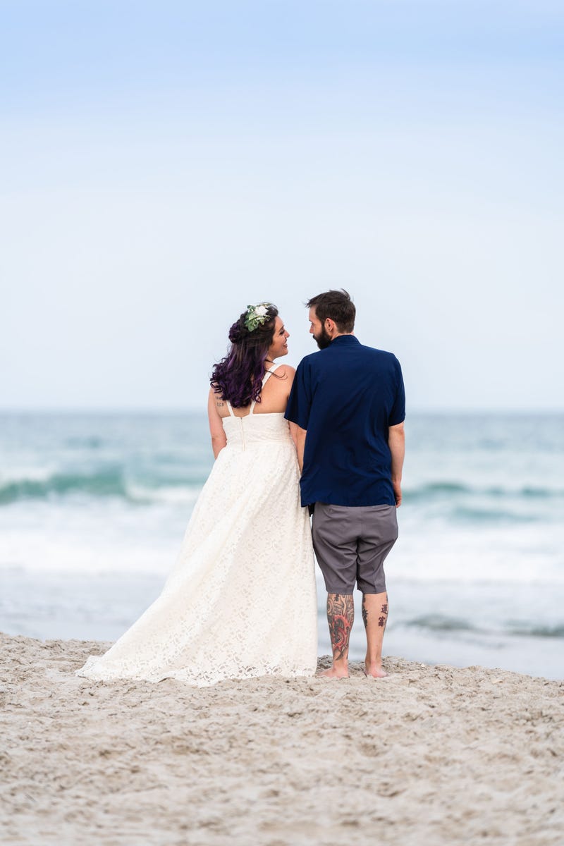 Alanna and Eric on the beach at sunset