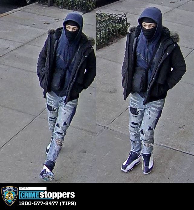 One of the suspects police are searching for in connection to two robberies