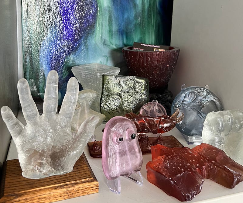 A display of multiple glass pieces.