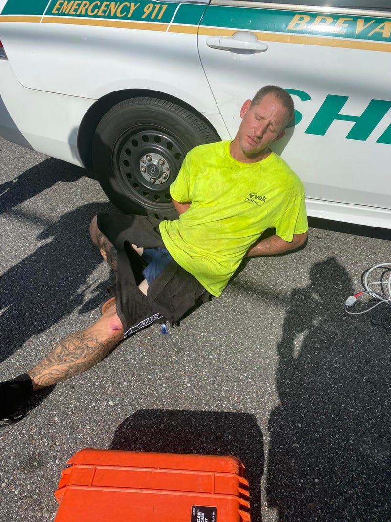 Raymond Hofmann in police custody after fleeing Brevard County Sheriff's deputies.