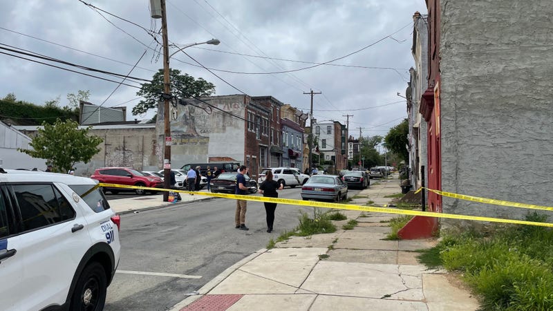 Caution tape lines the area where 22-year-old Tahiem Weeks-Cook was shot in the chest, stomach and leg on Friday as he tried to run from FBI agents.