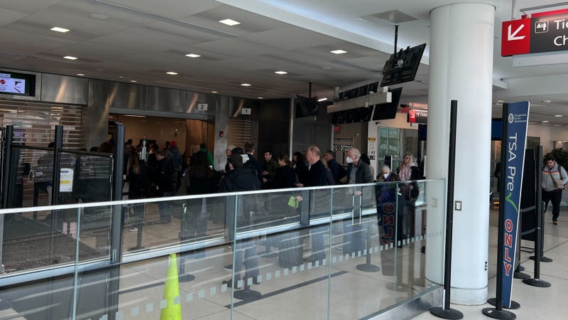 Travelers in line for TSA check-in at Philadelphia International Airport