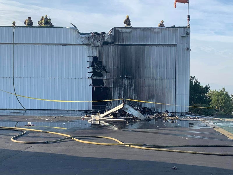 airport hangar destroyed by crash