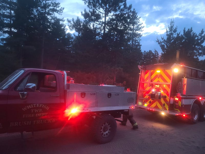 Officials are urging residents to steer clear as they work to contain and extinguish a wildfire that kindled in an eastern section of the Upper Peninsula.