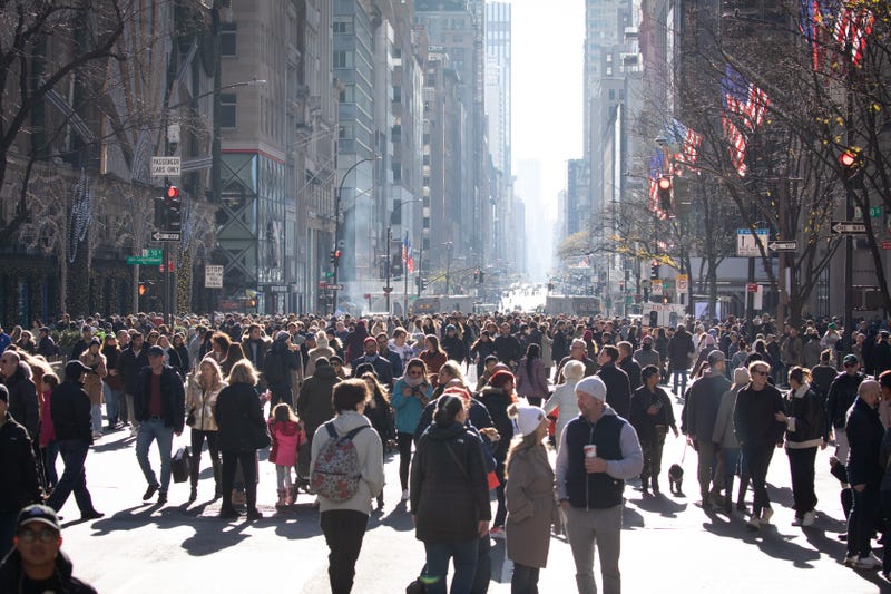 People take part in the 200th birthday bash for Fifth Avenue on Dec. 8, 2024