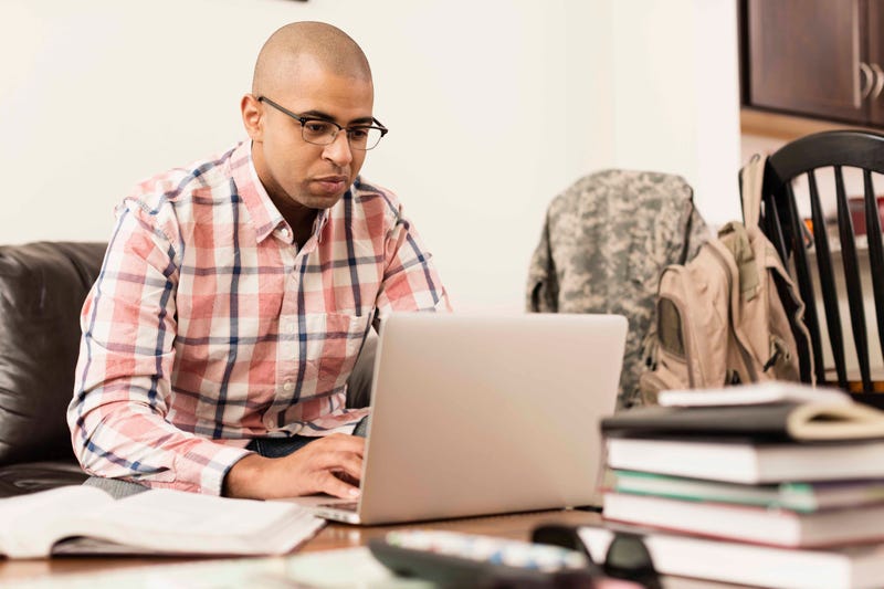 Adult student working on a computer