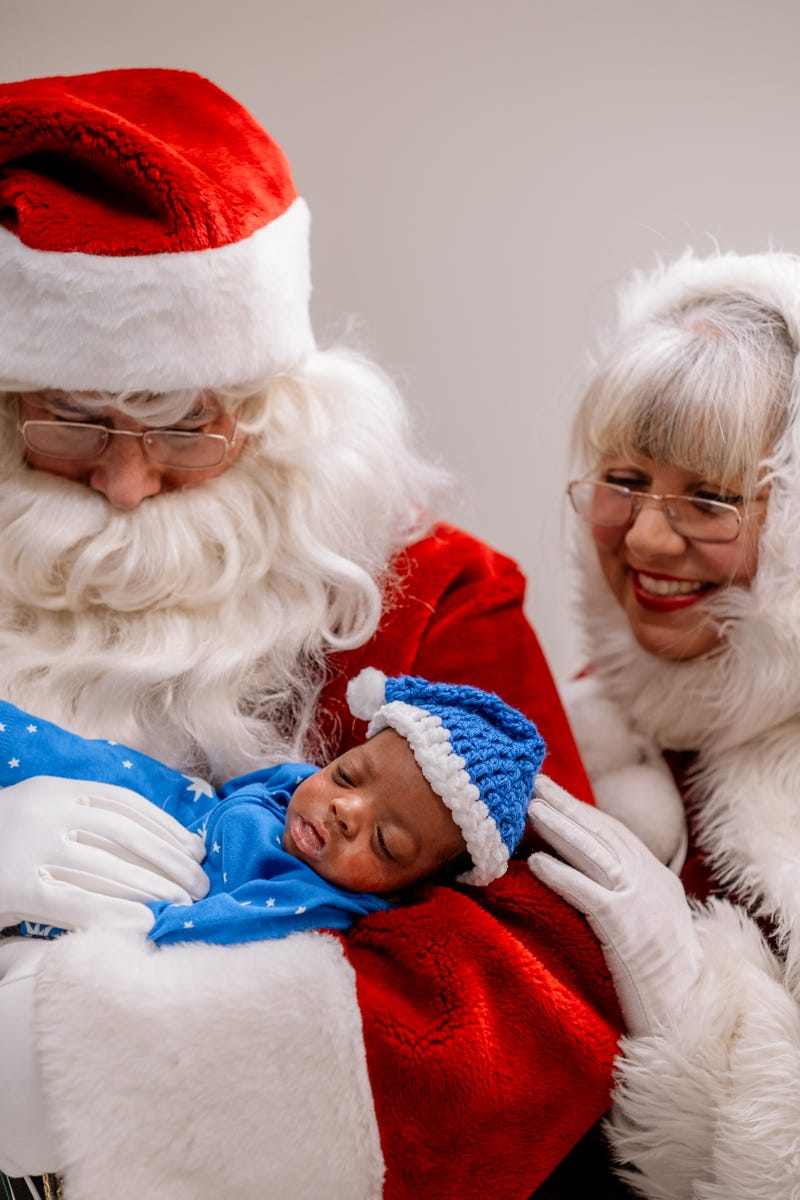 Santa, Ms. Claus with baby