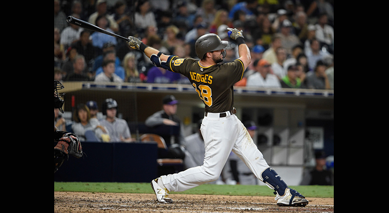  Austin Hedges #18 of the San Diego Padres hits a double during the seventh inning of a baseball game against the Colorado Rockies at PETCO Park on August 31, 2018 in San Diego, California. (Photo by Denis Poroy/Getty Images)