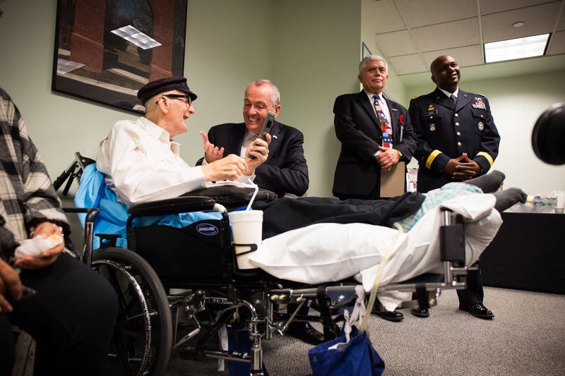 Gov. Phil Murphy visits with veterans and thanks them for their service.