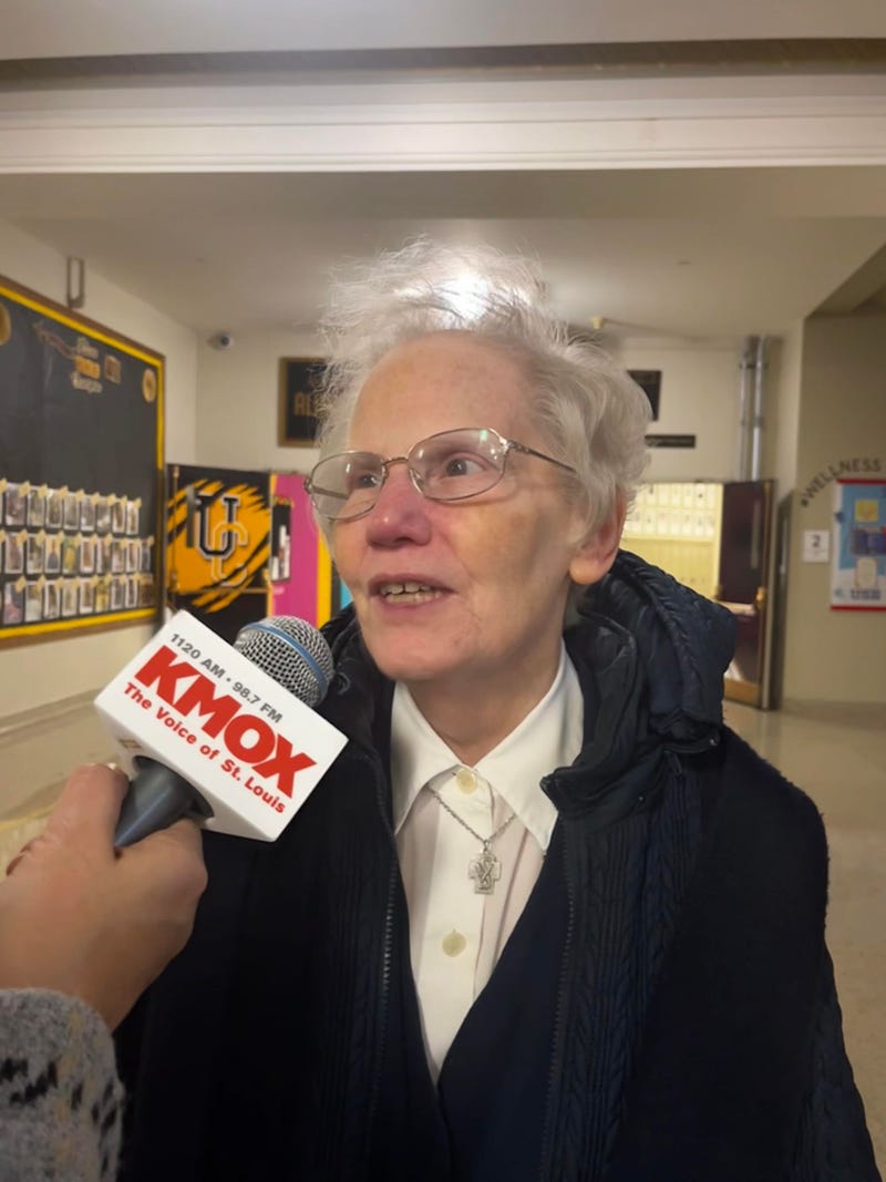 Sister Carol Schumer at her final graduation ceremony for Fathers & Families Support Center