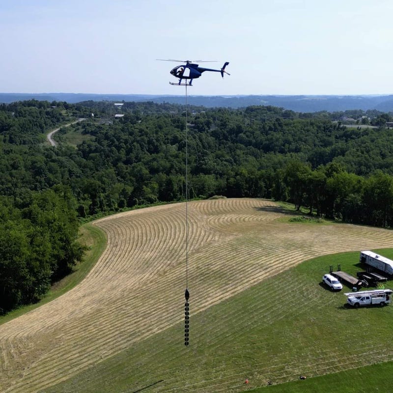 A giant buzz saw dangling from helicopter to make its way across Southwest Michigan