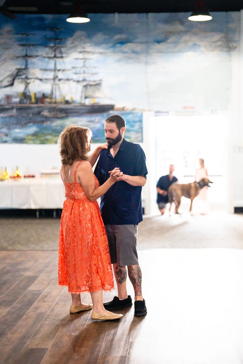 Eric and his mom, Libby, dance together