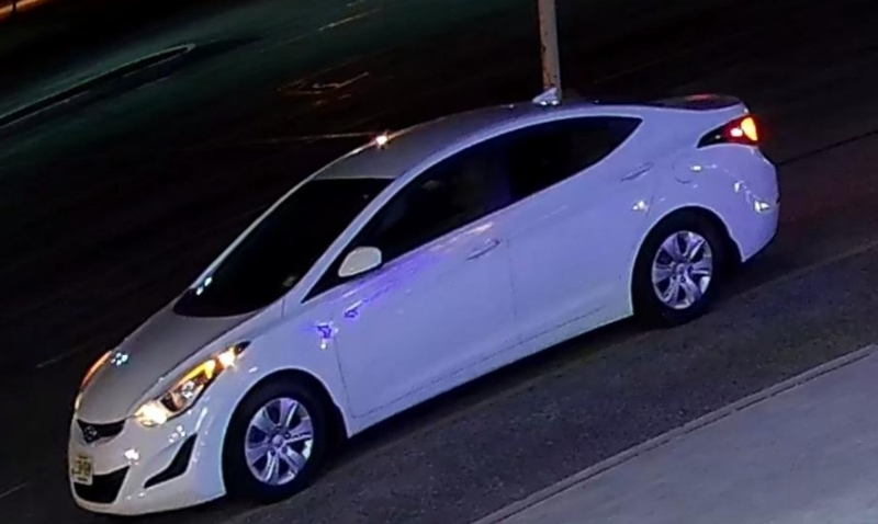 The four suspects arrived and fled in a white Hyundai sedan.