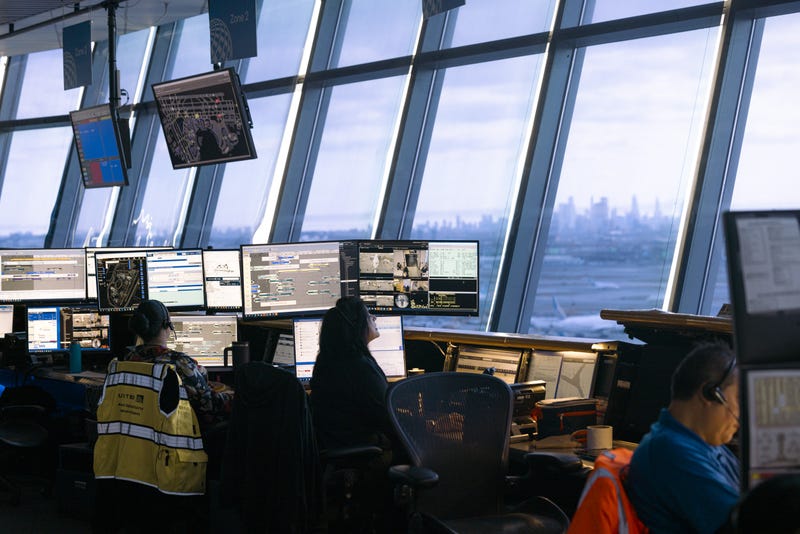 Workers in the United Airlines Station Operation Center at Newark Liberty International Airport (EWR) in Newark, New Jersey, US, on Tuesday, March 19, 2024