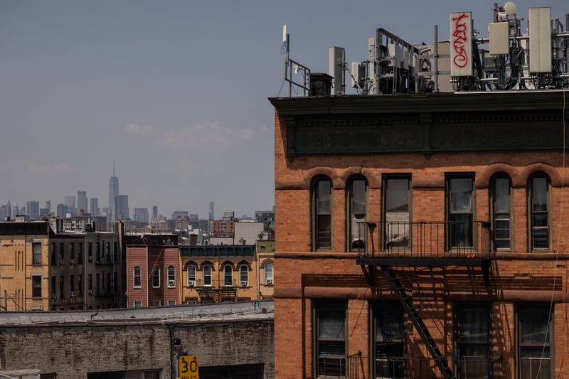 Residential apartment buildings in front of the Manhattan skyline in Queens