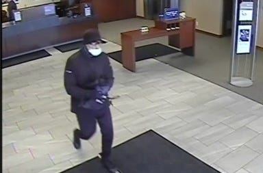 An still taken from surveillance shows the suspect in a bank robbery that took place Saturday in Wisconsin.