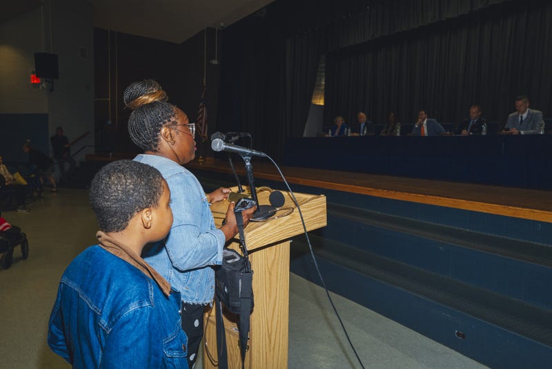 Kisha Skipper speaks at a community meeting regarding energy bills