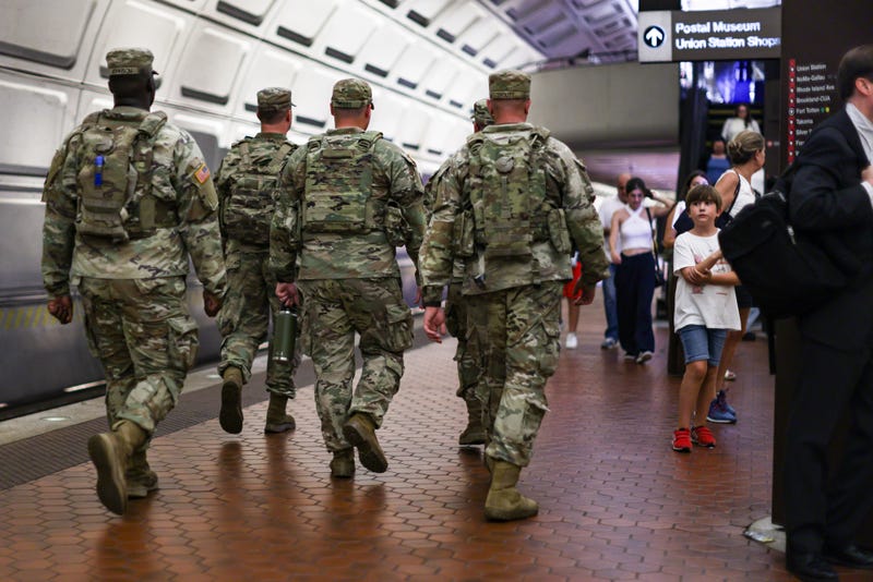 Members of the National Guard patrol the Union Station metro station in Washington on Aug. 20.