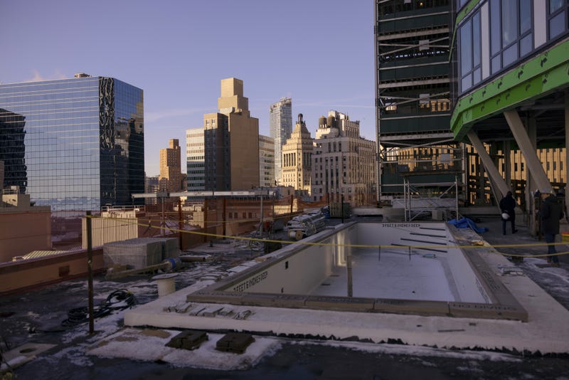 A pool area under construction on the twentieth floor of the SoMA residential tower at 25 Water Street in the Financial District of New York