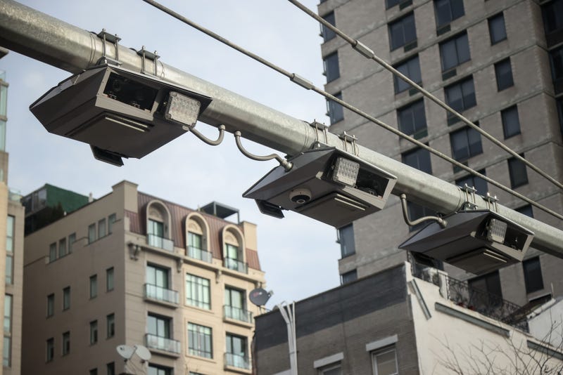 E-ZPass readers and license plate-scanning cameras over Second Avenue in New York