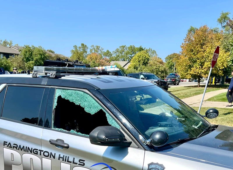Farmington Hills Police car with shattered window