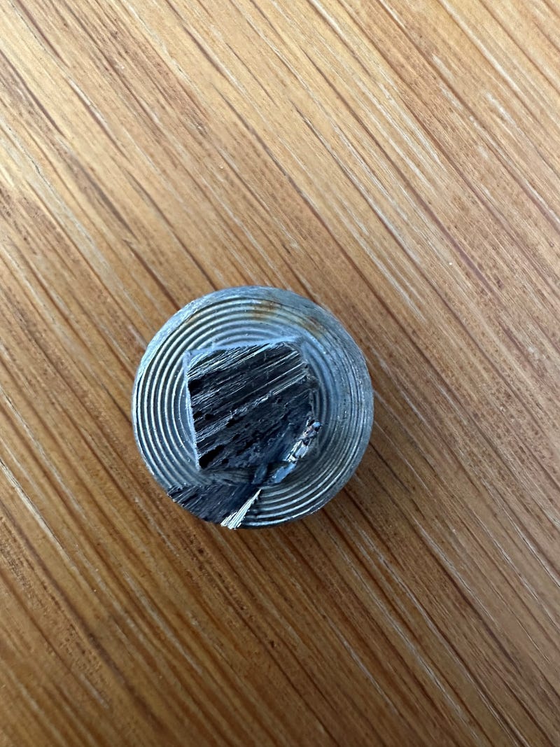 Bolt with saw marks