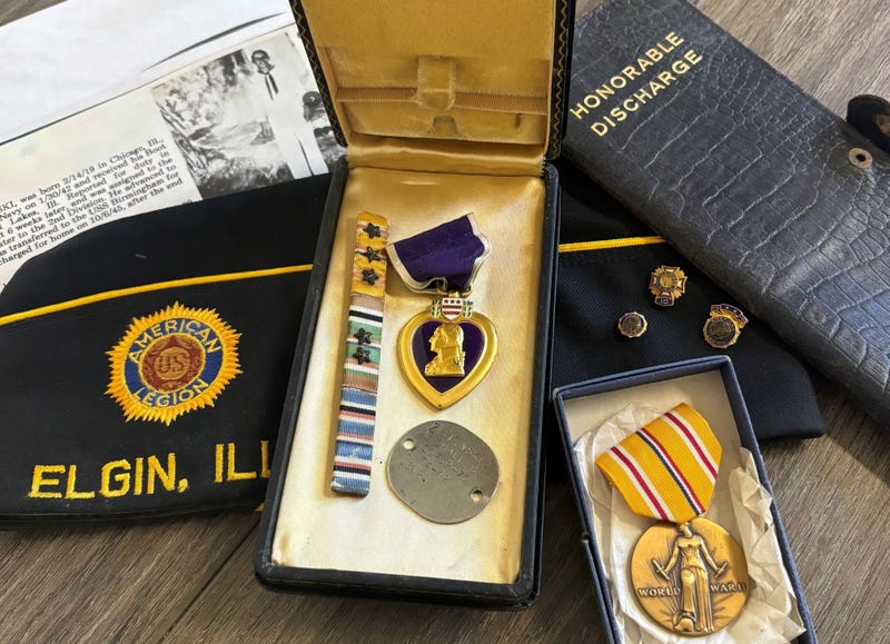 Belongings of World War II veteran Michael B. Zielinski, who served on the USS Birmingham and was awarded two Purple Heart medals. Zielinski died in 1978, and Kane County is trying to deliver his belongings to his next of kin.