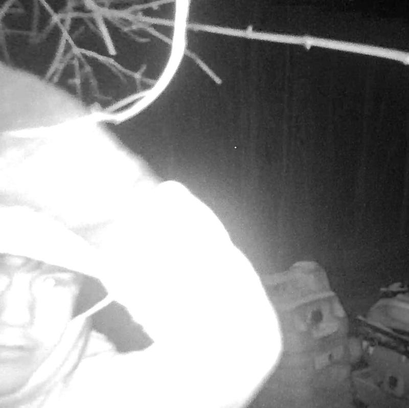 Closeup of man on security camera