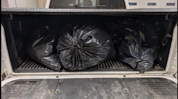Garbage bags in back of the vehicle