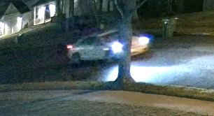 Police say the suspect in a Thursday night home invasion escaped in this white car.