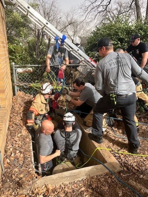 Fort Worth firefighters rescue a dog.
