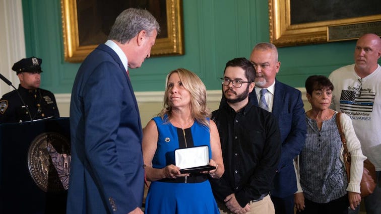 Mayor Presents Key To The City To Family Of Late NYPD Detective Lou Alvarez