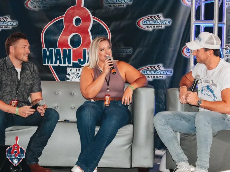 KMLE morning show hosts interview an artist