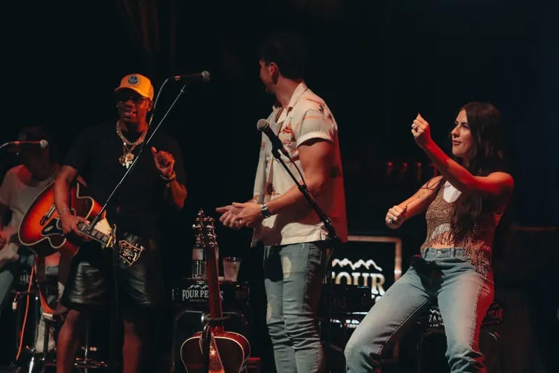 Artists on stage at KMLE 8 Man Jam 2022