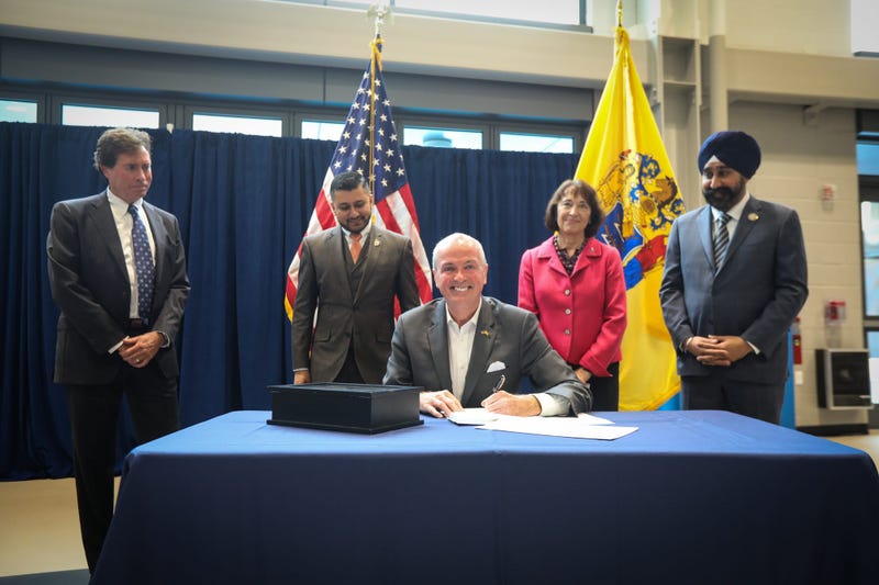 Gov. Phil Murphy signs an executive order to establish a statewide Climate Change Resiliency Strategy on October 29, 2019.