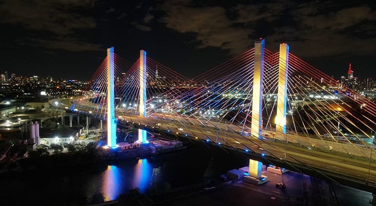 Kosciuszko Bridge lit in blue and gold