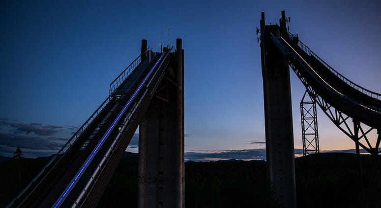 Olympic Jumping Complex in Lake Placid lit Blue & Gold