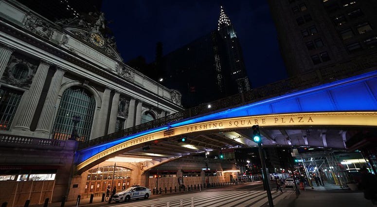 Grand Central Terminal lit in blue and gold