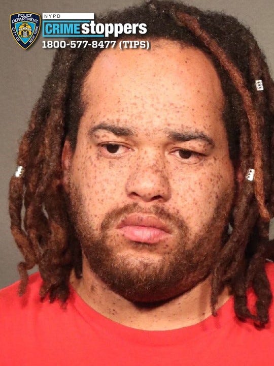 Police are searching for a man accused of breaking into a woman's Brooklyn home to kiss her.