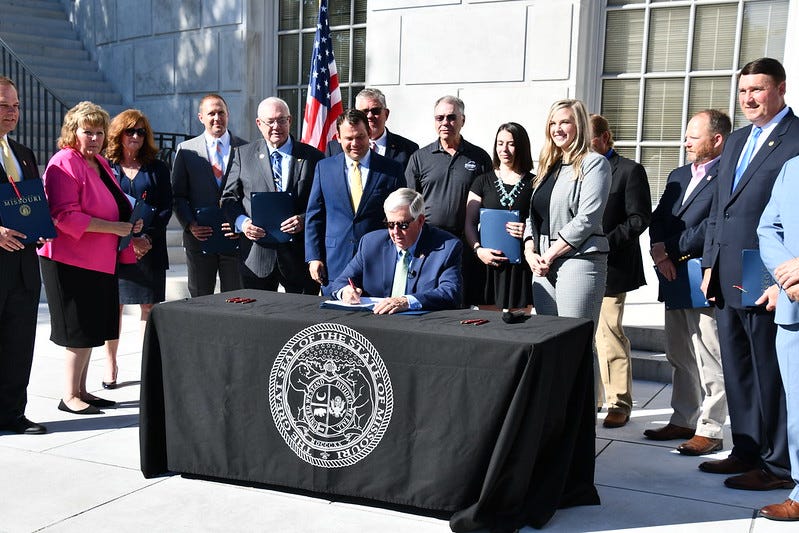 Mike Parson signs bill