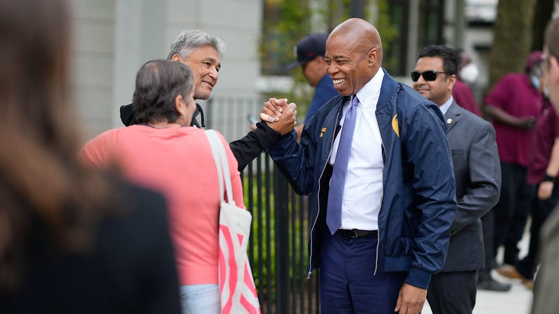 Can tossed at Eric Adams at Brooklyn event misses him, but hits security detail