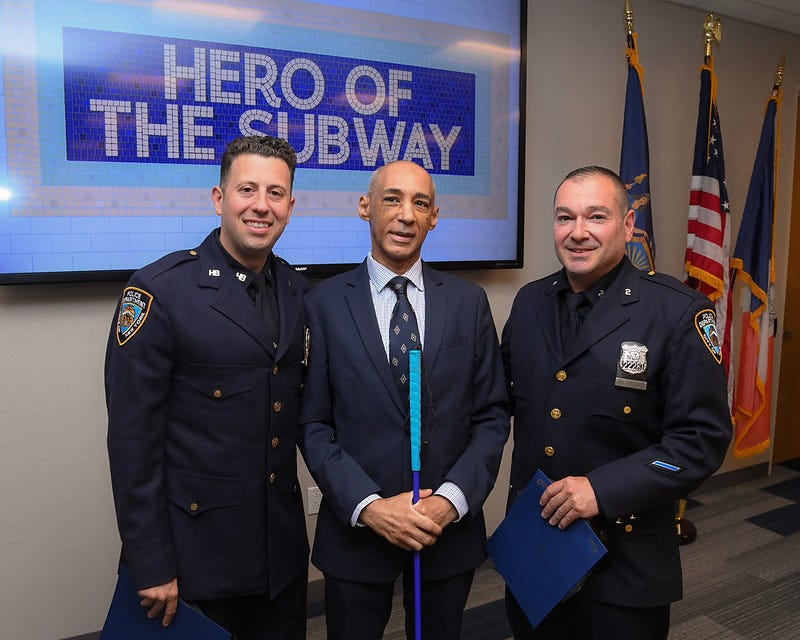 From Left: Detective Henry Greco, Suleiman Rifai and Officer Jason Macaluso