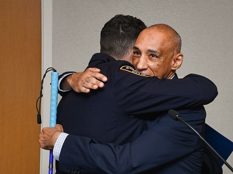 NYPD officer hugs rescued man